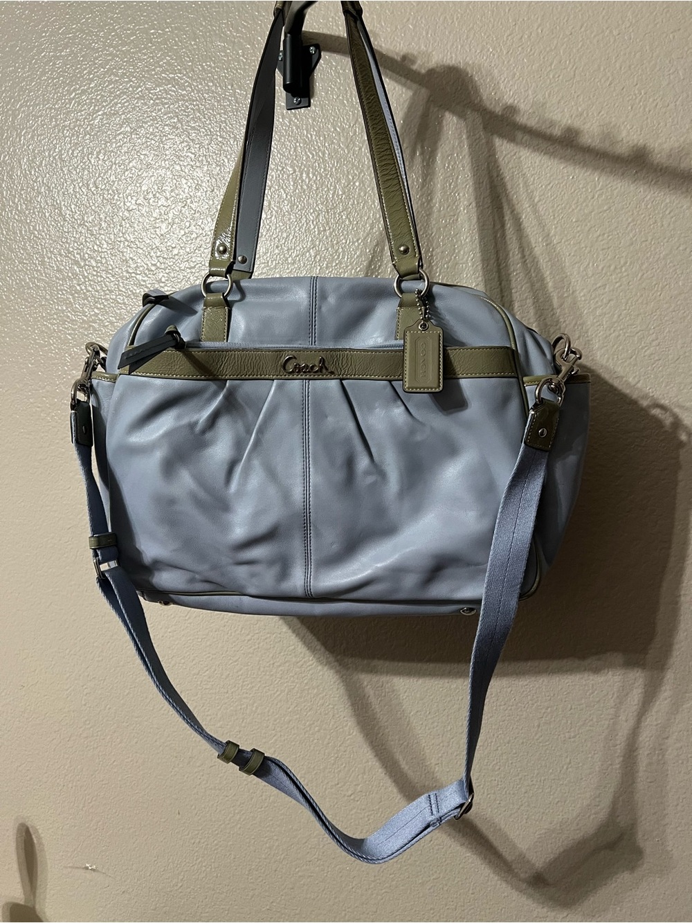 Coach light Blue Leather diaper bag with Olive Trim.